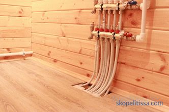 So machen Sie Fußbodenheizungen in einem Holzhaus: Optionen für das Gerät und die Installation